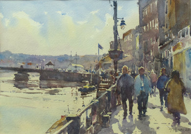 9.5 x 13.5 inch watercolour, looking into the sunlight, with a bridge over the river on the left, building on the right, with several people walking on the pavement beneath.