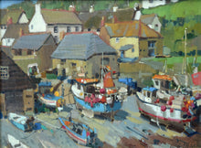 Load image into Gallery viewer, Lots of boats moored on the sand in the foreground, with a backdrop of cottages and a green hill behind and peek of blue sky in the top left corner.