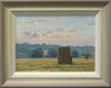 10 x 14 inch oil painting of haystacks in a meadow, with trees in the background, ever bluer up to the horizon on the hill where Collyweston Church is on the left side of the skyline, with the sun breaking through a cloud. Also shows the frame with an off-white inner edge, gradating to a darker grey/beige outer edge.