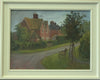 12 x 16 inch oil painting of brick cottages in Lyndon village, on an overcast afternoon, with s bench on the grass verge in the right foreground. Shows off-white frame.