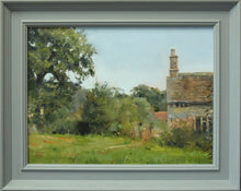 Load image into Gallery viewer, 12 x 16 inch oil painting of an old cottage on the right of the picture, foreground grass and many trees as a backdrop, with a large oak tree on the left. Shows the grey-coloured frame.
