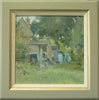 12 x 12 inch oil painting, with various leaning sheds at the back of an old workman's cottage, with a figure walking towards us on a grassy path between the sheds and some trees. Shows green/grey frame with buff inner slip