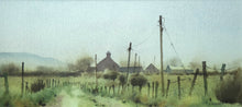 Load image into Gallery viewer, A letterbox-shaped 6 x 13 inch watercolour of a farmhouse and some barns, painted on a damp day in Pembrokeshire, with a track taking the eye from bottom left of centre round to the right , with some bushes, fenceposts and telegraph poles simply described. 
