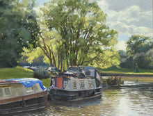 Load image into Gallery viewer, A 9 x 12 inch oil painting of the canal at Hillmorton, with a couple of narrowboats moored-up, with sunlight streaming through a tree on the far bank, with ripply reflections in the water.
