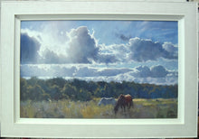 Load image into Gallery viewer, Magnificent 20 x 31.5 inch acrylic painting of two horses grazing in a Summer meadow, with trees in the middle distance and a beautifully rendered, sunny sky with big cumulus clouds and sunlight beaming through them, showing pale whitewashed frame
