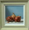 10 x 10 inch Oil on Linen Canvas painting, with three onions on a white cloth, light source from the left, with a light blue background, beautifully painted in infinite detail, with a neutral-coloured frame and white inner slip.
