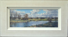 Load image into Gallery viewer, A panoramic 8 x 20 inch acrylic painting, depicting a river with distant blue skyline of trees, loosely described trees on the far bank, and a lively sky.  Shows whitewashed frame
