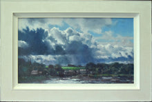 Load image into Gallery viewer, 15 x 26 acrylic painting by Carl Knibb, with, as the title suggests, a really dramatic sky , with big storm clouds above the Northumberland village of Cresswell, with sunlit roofs of some cottages and dark, silhouetted trees - a stunning painting! Shows whitewashed frame.
