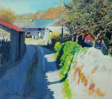 Load image into Gallery viewer, farm barns on the left and at the end of a track, with a stone wall on the right of the track, and strong sunshine lighting up the wall and casting strong blue shadows across the track and wall.
