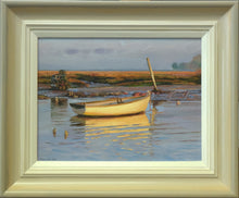 Load image into Gallery viewer, 9 x 12 inch oil painting of a white-hulled boat on the water, glowing yellow in the late Winter sunshine, with a high horizon. Shows the buff coloured frame with a grey outer edge and off-white inner slip.
