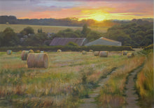 Load image into Gallery viewer, 20 x 28 inch oil painting of the golden setting sun on a high horizon, hedgerows in the middle and far distance, and two large barns, with many round bales on a stubble field in the foreground.
