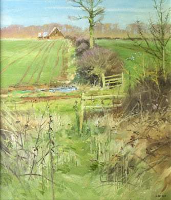 Portrait-shaped 17 x 15 inch oil painting of a typical March landscape, with a line of sunlit bare trees on the horizon, with a barn left of centre, a hedgerow stretching from down the centre in the distance down towards the foreground, with a farm track going across from left to right, with two open gates and foreground dead vegetation.