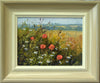 Thickly painted small 6 x 8 inch oil of poppies and mayweed in the foreground on the edge of a cornfield, with hazy, distant fields. Shows frame with greyish outer colour, gradating to off-white inner edge.