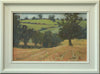 8 x 12 inch oil painting of a golden stubble field with a row of trees taking the eye down a hill and a large Oak tree in the right middle distance, more trees in the far distance. Shows off-white frame.