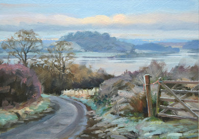 7 x 10 inch oil painting of Rutland Water in the frost, with the hambleton peninsula on the far side and the road from Lyndon winding downward in the foreground.