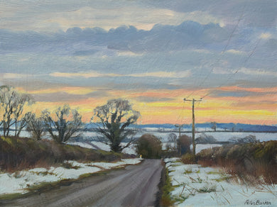 Oil painting with view towards Bisbrooke across snow-covered fields and dark, bare trees against a yellowy horizon and blue-grey clouds. Painting size 6 x 8 inches.