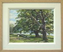 Load image into Gallery viewer, A 9 x 12 inch oil painting of a big, vigorous Oak tree next to an old, dead Oak, close to the shores of Rutland Water at Barnsdale, with a few sheep resting in the shade. Also shows cream inner frame moulding with plain Oak outer frame.
