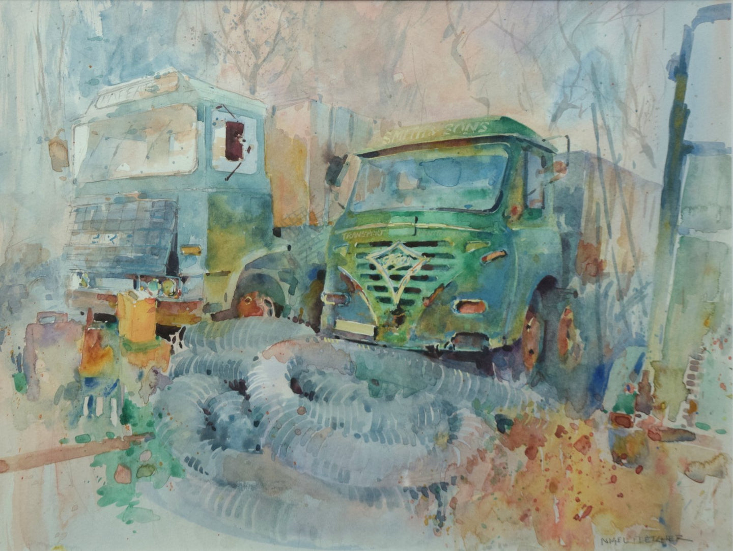Portrait of two old lorries, rusting away in their graveyard, with a tangle of flexible pipework in the foreground.