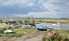 Load image into Gallery viewer, 10 x 17 inch oil painting of a stormy sky at Morston in Norfolk, with several sunlit boats in the foreground, and a crowd ready to board a boat taking folks out to see the Seals.
