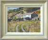 9 x 12 inch oil painting of a white-painted farmhouse on a hill, with a stone barn alongside it, with a track leading through rough grassland up to it. Fresh washing is on the line. Shows the gradated-coloured frame, with an off-white inner edge to grey outer edge.
