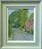 12 x 9.5 inch oil painting, depicting red brick house on the right, backdrop of trees and the three-way signpost left of centre, showing the plain green/grey frame with off-white inner slip.