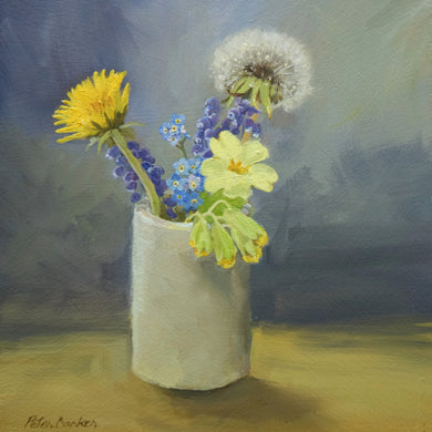 Small square oil painting in a black, floating frame, depicting a Dandelion flower and a Dandelion Clock, with a Cowslip, Grape Hyacinth and Forget-Me-Nots in a little clay pot with a bluish background and an ochrey foreground.