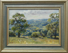 Load image into Gallery viewer, Small oil landscape of distant back-lit trees with a mature oak tree on the left and a small one on the right, and a meadow in th foreground, with an open gate beckoning us to walk through. Also shows the silver and blue frame.
