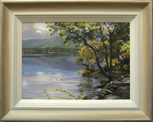 Load image into Gallery viewer, Bassenthwaite Lake oil painting by Peter Barker, fitted in its hand-coloured frame, with off-white inner edge, gradating to darker beiges and a revealed metallic-bronze outer edge.
