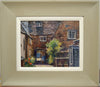 Same painting showing greenish-beige frame with white slip