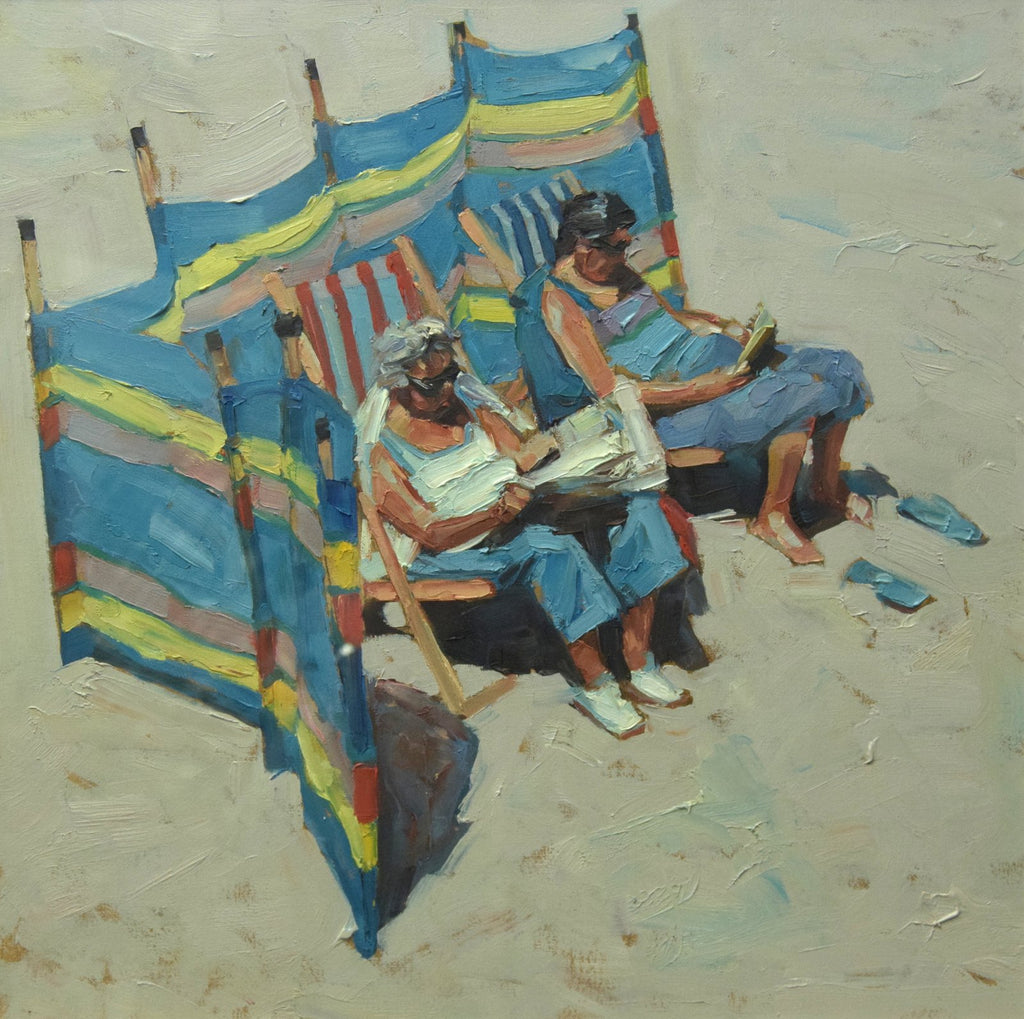 Oil painting of two older ladies on the beach behind a colourful windbreak, on deck chairs, reading, enjoying some me time!