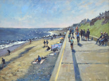 Load image into Gallery viewer, Oil painting of people walking along Southwold&#39;s promenade with buildings top right above steep grassy bank and people on beach
