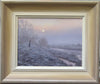 Rising sun oil painting in a pale painted frame with outer edge rubbed off to reveal metallic silvery gold.