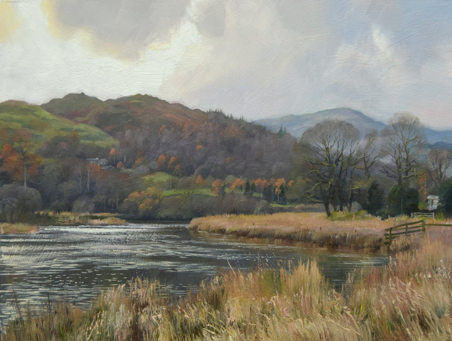 Oil of the River Brathay in the Lakes in Winter, bare trees, brown vegetation, sun breaking through above the distant mountains
