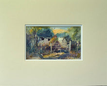 Load image into Gallery viewer, Small 6 x 10 inch watercolour of an allotment gate, with sheds visible, a peachy coloured sky above some blueish trees, with loosely descibed purple vegetation in shade and warmer area around the gate, crisp washes over wet-in-wet passages - beautiful! Mounted with a wide, double cram and white mount.
