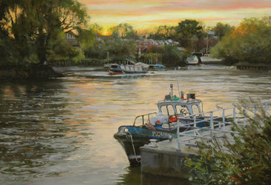 A 13 x 19 inch Pastel of a boat in the right foreground, tied to a landing stage by the Thames, with trees on the far bank set against a golden sky with a yellow sun on the horizon.